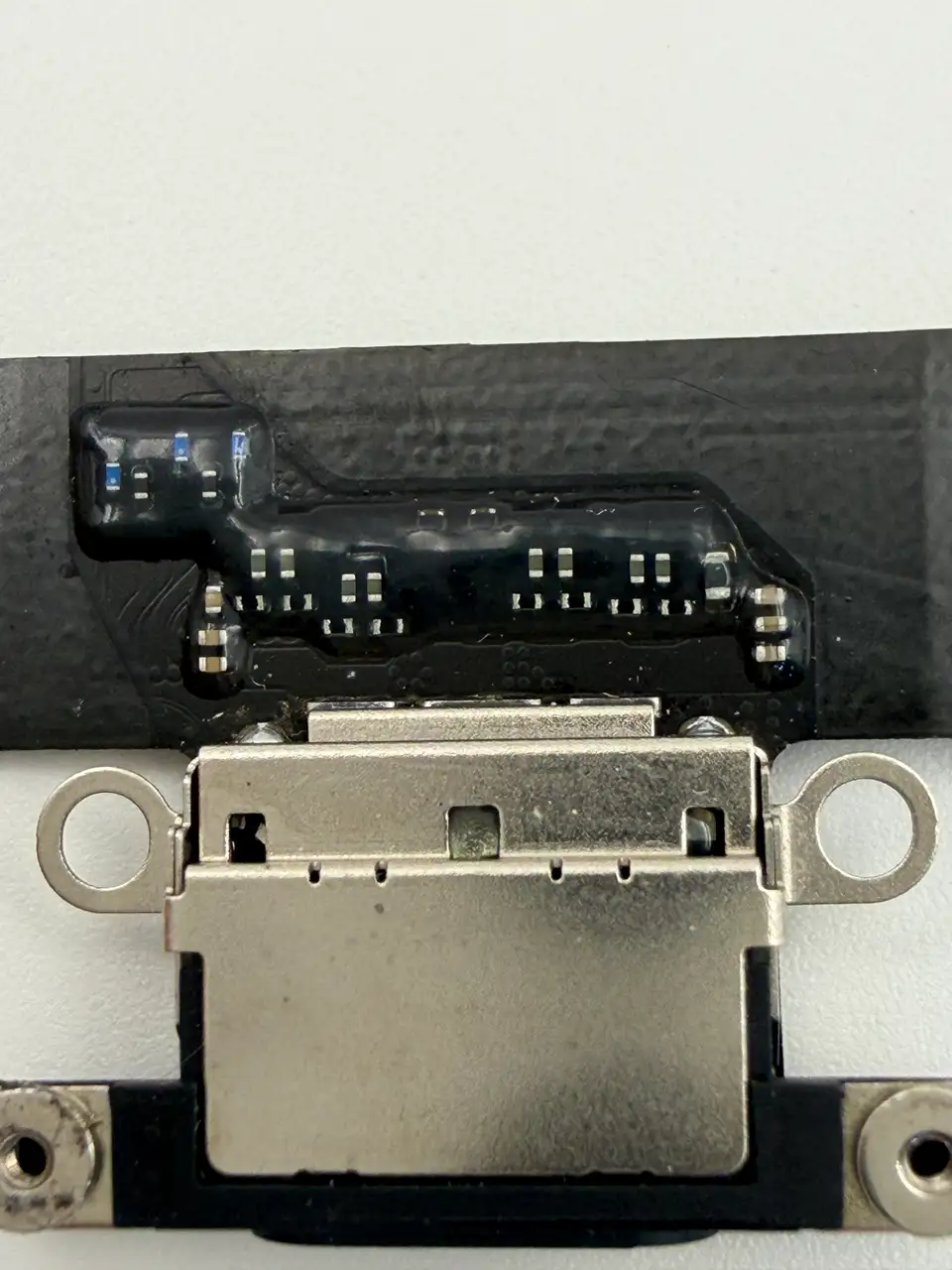 Original Pulled iPhone 16 Plus Charging Port Flex Cable photograph 3
