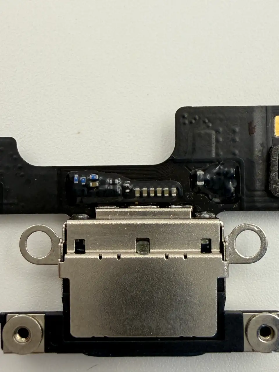 Original Pulled iPhone 16e Charging Port Flex Cable photograph 3